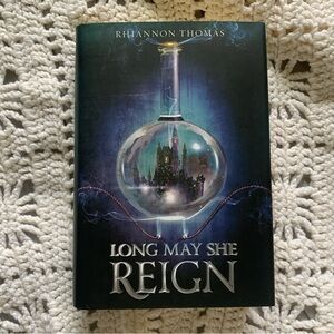 Long May She Reign by Rhiannon Thomas | Hardback | Used Book:Very Good Condition